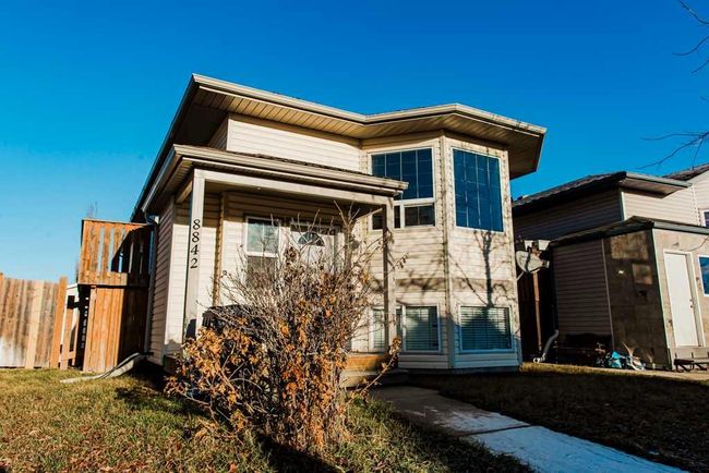 8842 66 Avenue, Home with 4 bedrooms, 3 bathrooms and 3 parking in Grande Prairie AB | Image 2