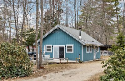 View of front of home with a deck | Image 1