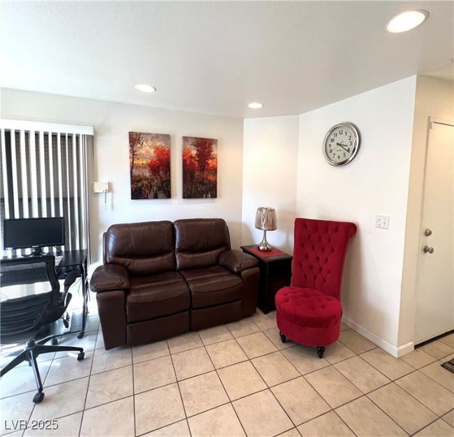 Living room featuring baseboards, recessed lighting, and light tile patterned floors | Image 10