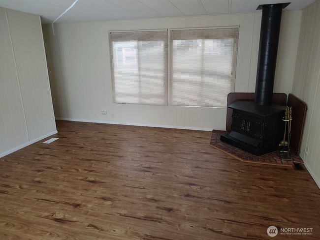 A cozy wood stove greets you on those chilly days | Image 19