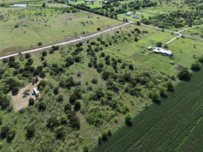 Aerial view of property's location featuring rural landscape and abundant farmland | Image 17