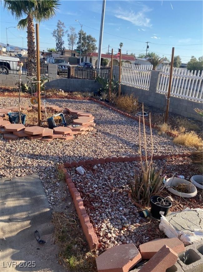 View of yard featuring fence | Image 31