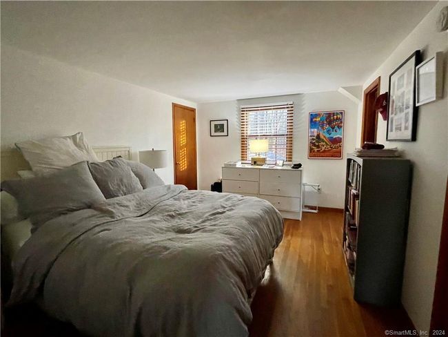 Upstairs Apartment Bedroom | Image 24