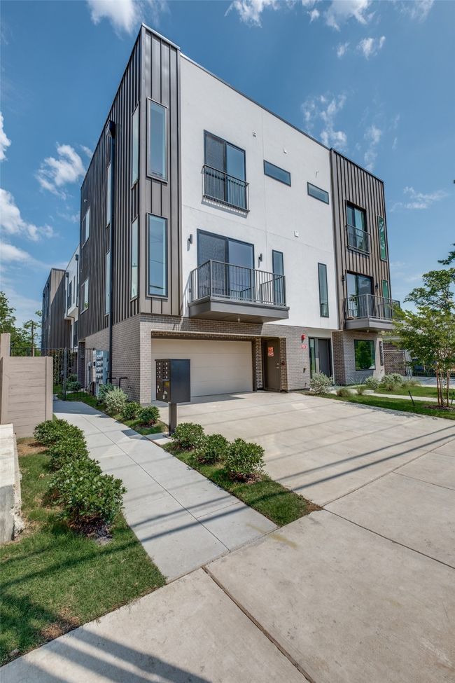View of property with driveway and a garage | Image 29