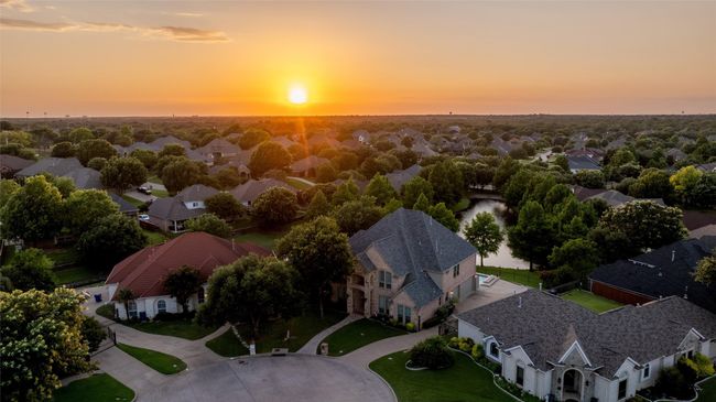 Aerial view at dusk of a residential view | Image 5