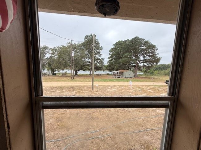 View of lake from living room | Image 49