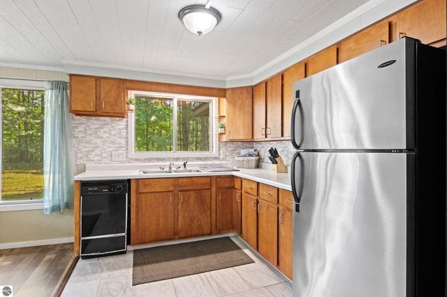 6015 Crystal Beach Rd Nw, House other with 4 bedrooms, 2 bathrooms and null parking in Rapid City MI | Image 15