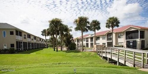 101-458 Bouchelle Dr, NEW SMYRNA BEACH, FL, 32169-5461 | Card Image