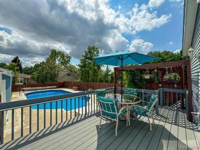 Deck overlooking pool. | Image 2