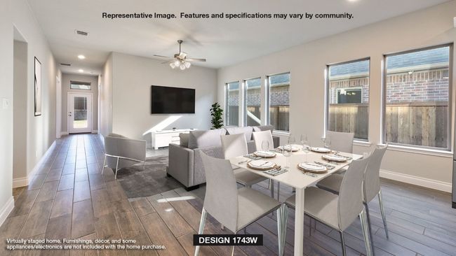 Dining room with wood finish floors, baseboards, ceiling fan, and recessed lighting | Image 5