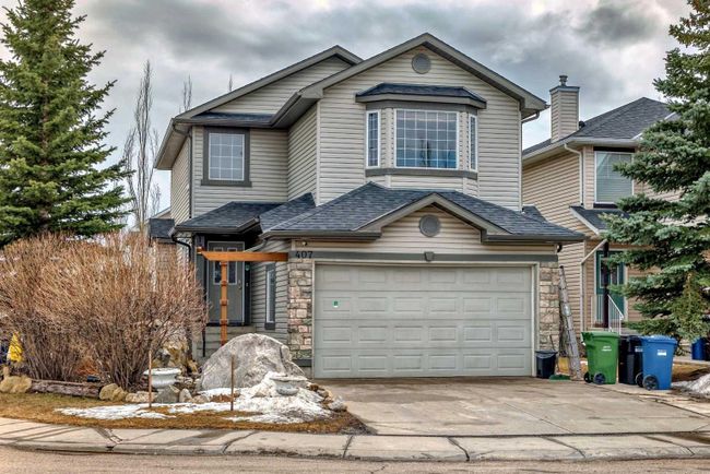 407 Bridlewood Avenue Sw, Home with 6 bedrooms, 3 bathrooms and 4 parking in Calgary AB | Image 1