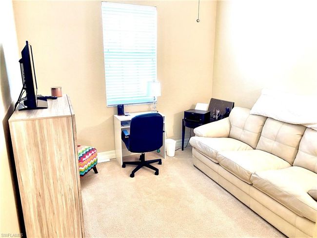 Carpeted office featuring baseboards | Image 14