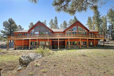 Back of house featuring an expansive deck | Image 2