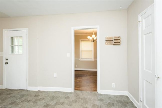 A view into the dining room from the kitchen | Image 24