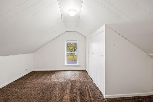 Spacious up stairs bedroom with a lot of storage. | Image 16