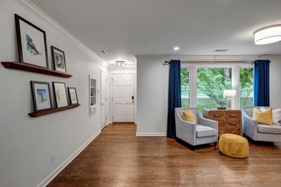 A view of the front door looking at the front sitting area. | Image 3