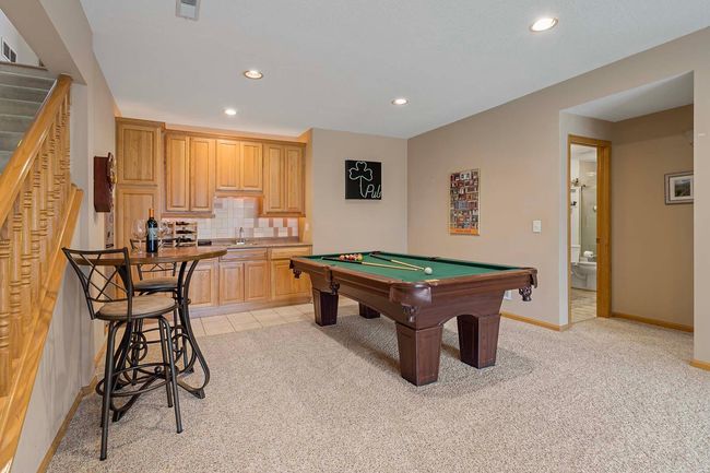 You'll love entertaining - a wet bar, and plenty of storage for all your needs. | Image 22