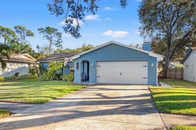 1422 Red Oak Drive, House other with 3 bedrooms, 2 bathrooms and null parking in TARPON SPRINGS FL | Image 1