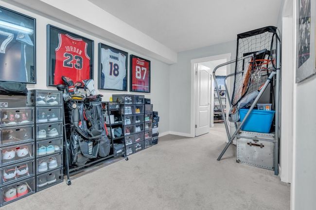 Workout room featuring baseboards and carpet floors | Image 24