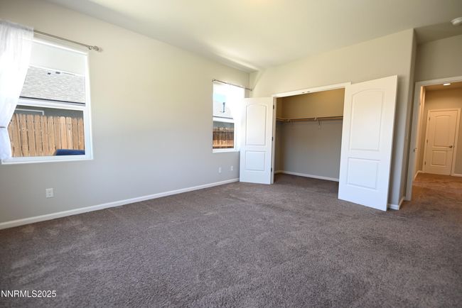 Primary walk in closet | Image 13