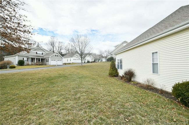 Large side yard, welcoming in the warm months. | Image 37