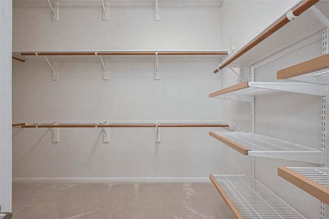 Spacious walking closet, making it the perfect solution for organizing and accommodating all your belongings. | Image 25