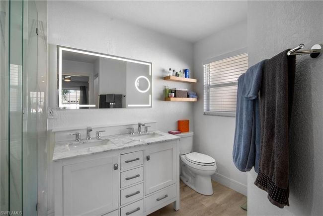 23485 Olde Meadowbrook Cir, House other with 3 bedrooms, 2 bathrooms and 2 parking in ESTERO FL | Image 23