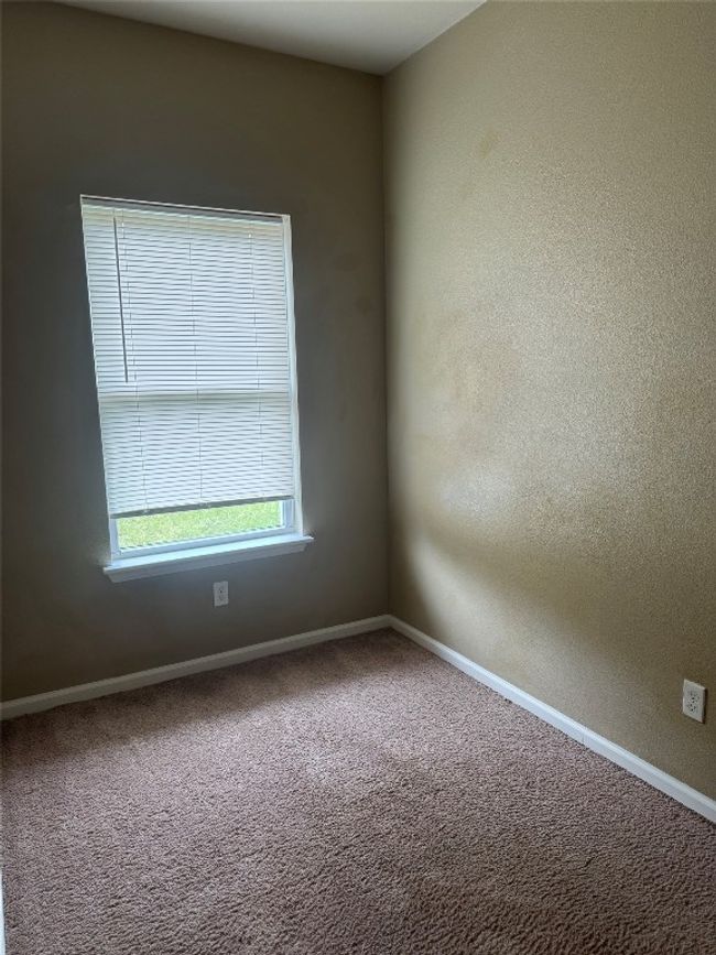 Empty room featuring baseboards and carpet floors | Image 7