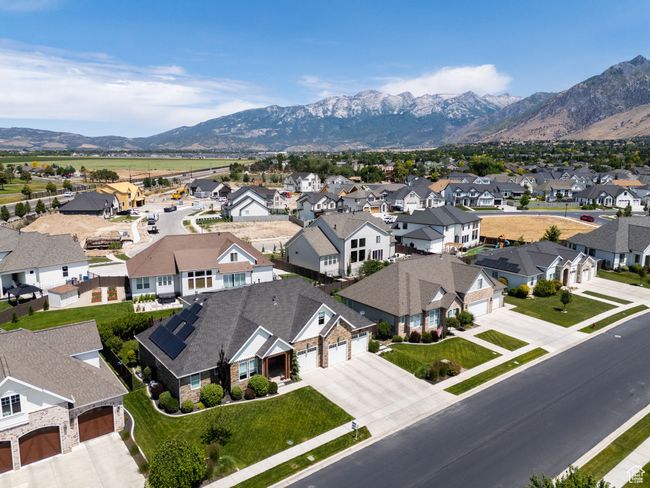 Aerial view of residential area with a mountain backdrop | Image 82