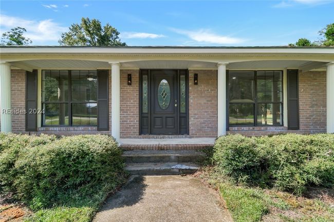 Property entrance featuring a porch | Image 4