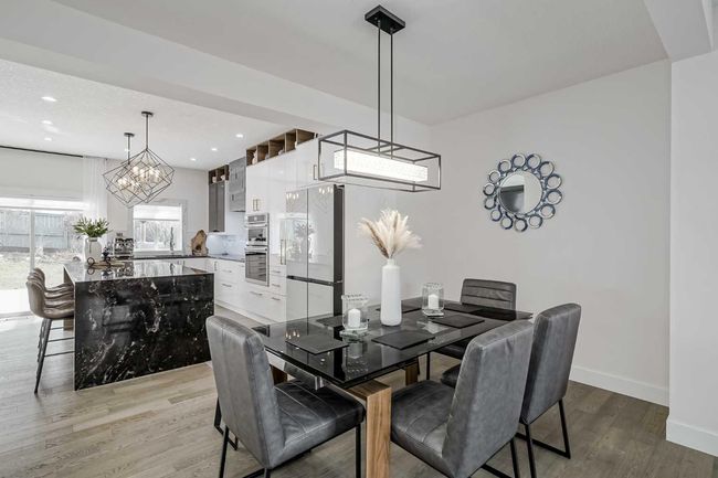 122 Rockywood Cir Nw, House other with 4 bedrooms, 4 bathrooms and 4 parking in Calgary AB | Image 7