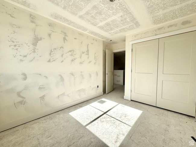 Unfurnished bedroom with a closet | Image 18