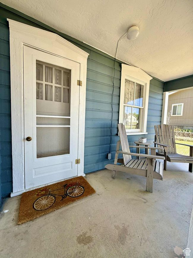 Property entrance featuring covered porch | Image 4
