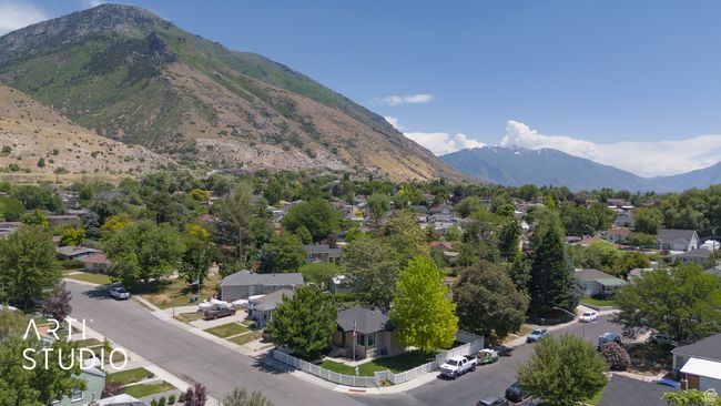 Mountain view with nearby suburban area | Image 15