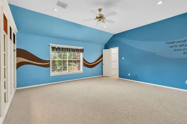 Gameroom has bulit ins and is central to the upstairs bedrooms. | Image 28