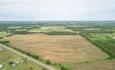 Bird's eye view with a water view and a rural view | Image 1