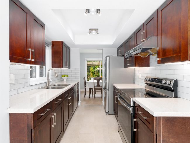 Updated kitchen with stainless steel appliances. | Image 4