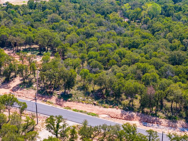 Aerial view of a heavily wooded area | Image 14