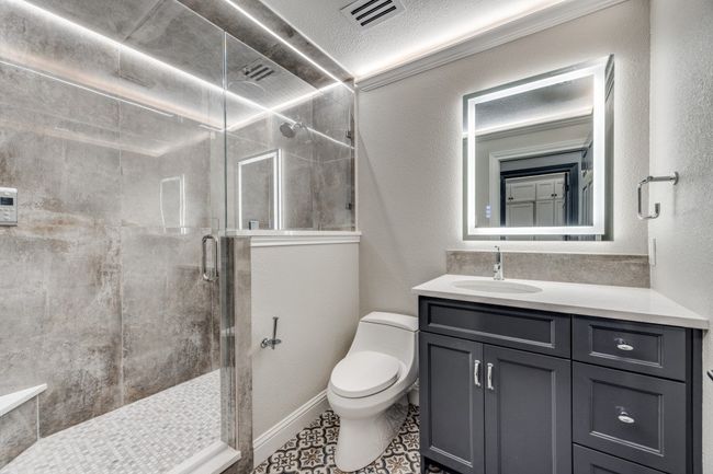 Full bathroom with vanity and a shower stall | Image 16