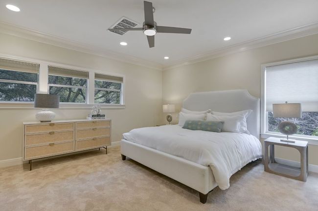 Second-floor primary bedroom with natural light, recessed lighting and carpet. Don't miss the versatile bonus room—ideal for work, relaxation, or exercise | Image 16