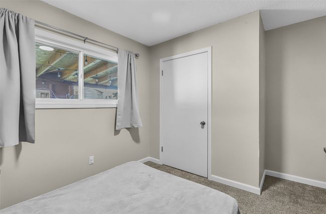 Bedroom featuring baseboards and carpet flooring | Image 22