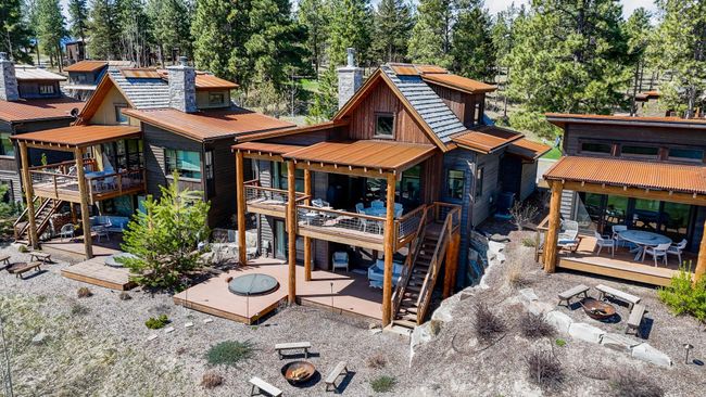 Spacious double decks equipped with a hot tub and fire pit for ultimate relaxation | Image 5
