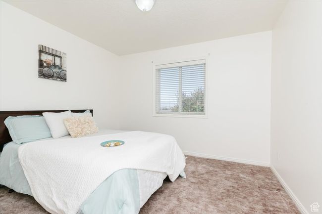 Bedroom with baseboards and carpet floors | Image 23