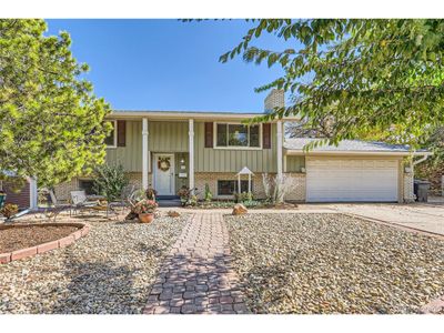 348 S Tucson Way, House other with 3 bedrooms, 2 bathrooms and null parking in Aurora CO | Image 1