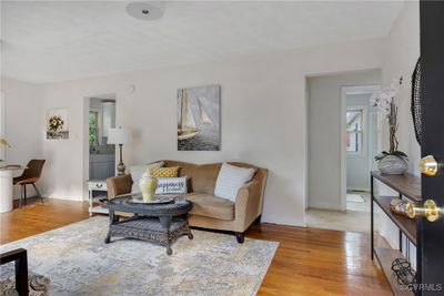 Living room with light hardwood / wood-style flooring | Image 2