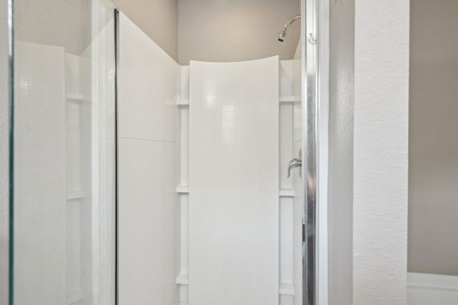Bathroom featuring a walk in shower | Image 28