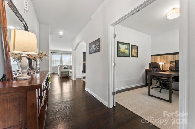 Walking in you'll see gleaming hardwoods throughout the 1st floor living area. | Image 6
