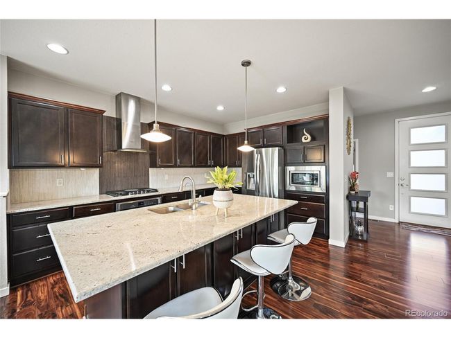 10934 Touchstone Loop, House other with 4 bedrooms, 4 bathrooms and null parking in Parker CO | Image 12