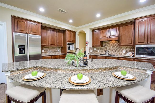 7003 Paxton Ct, House other with 5 bedrooms, 4 bathrooms and 3 parking in Sugar Land TX | Image 14