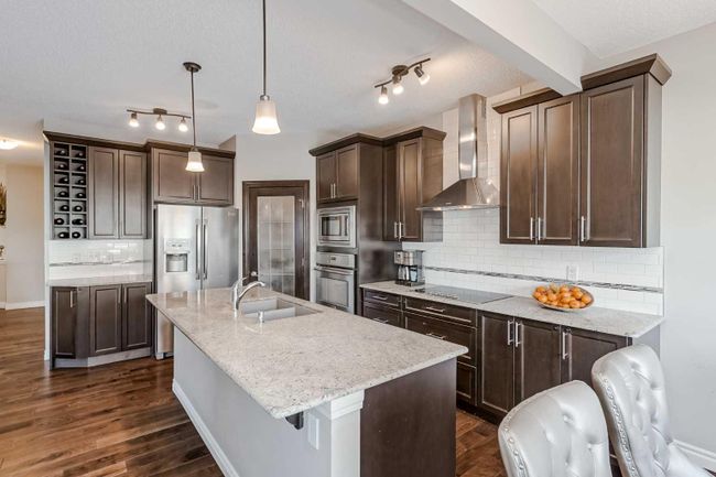 168 Cougar Ridge Manor Sw, Home with 4 bedrooms, 3 bathrooms and 4 parking in Calgary AB | Image 2